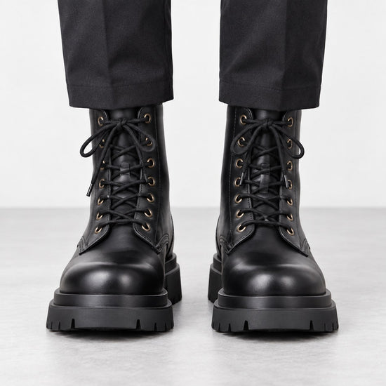 Black leather lace up combat boots