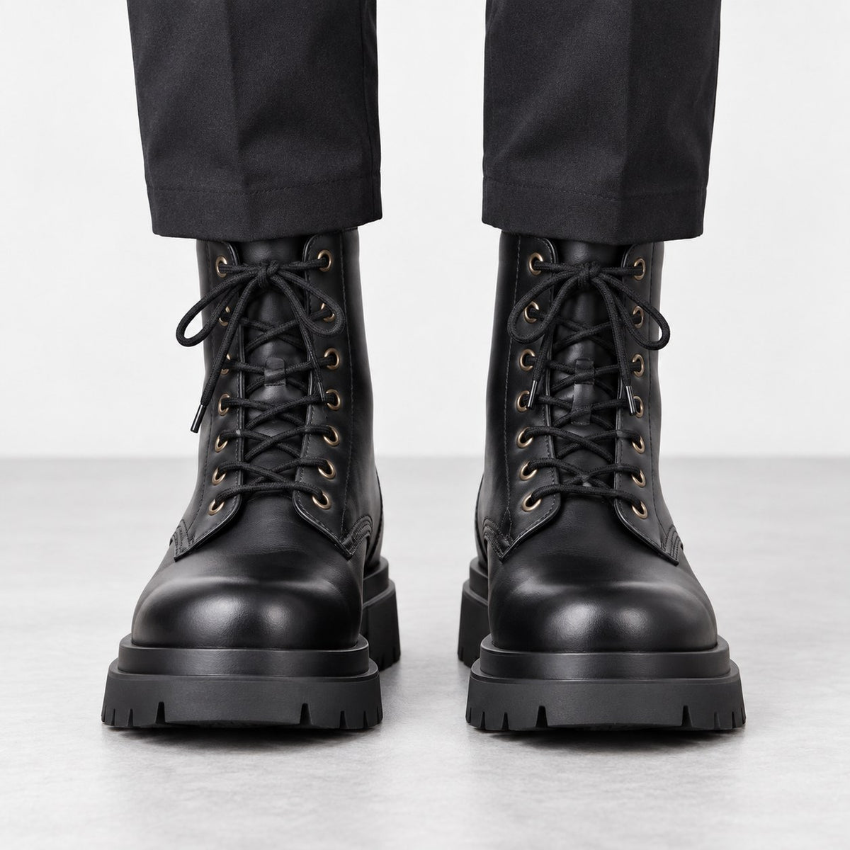 Black leather lace up combat boots