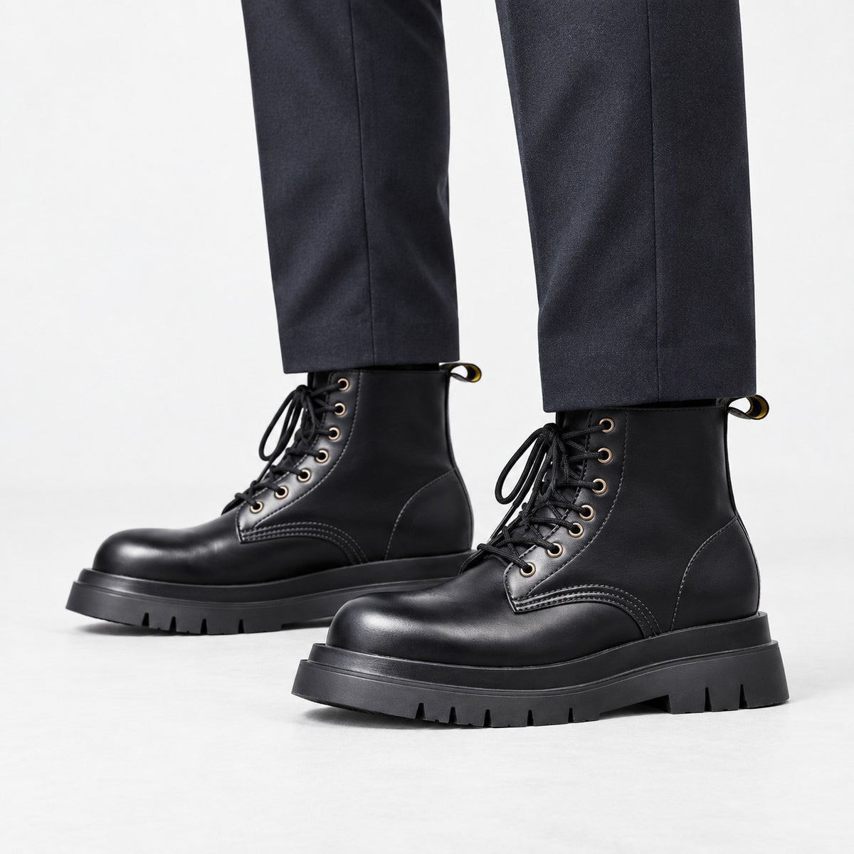 Black leather lace up combat boots