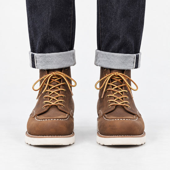 Leather moc toe wedge sole boots