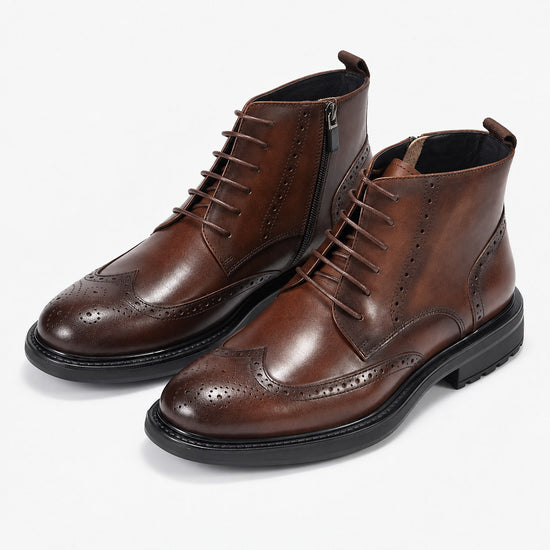 Leather wingtip boots with side zips