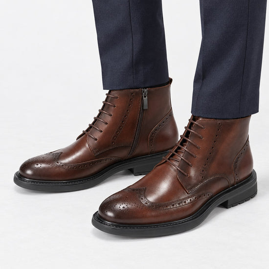 Leather wingtip boots with side zips