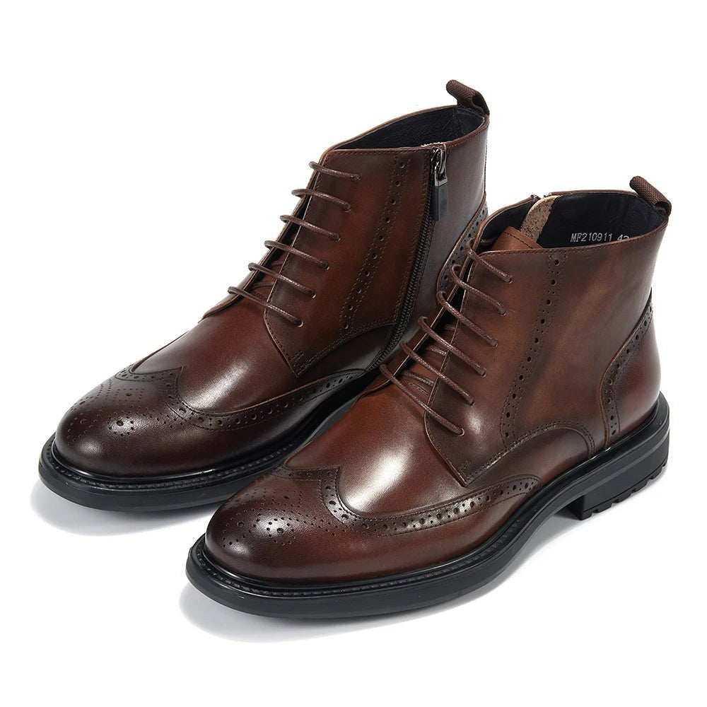 Leather wingtip boots with side zips