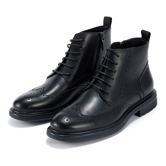 Leather wingtip boots with side zips