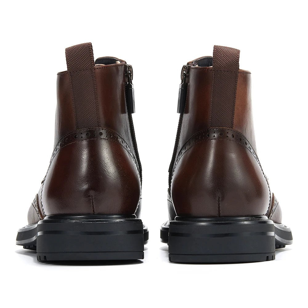 Leather wingtip boots with side zips