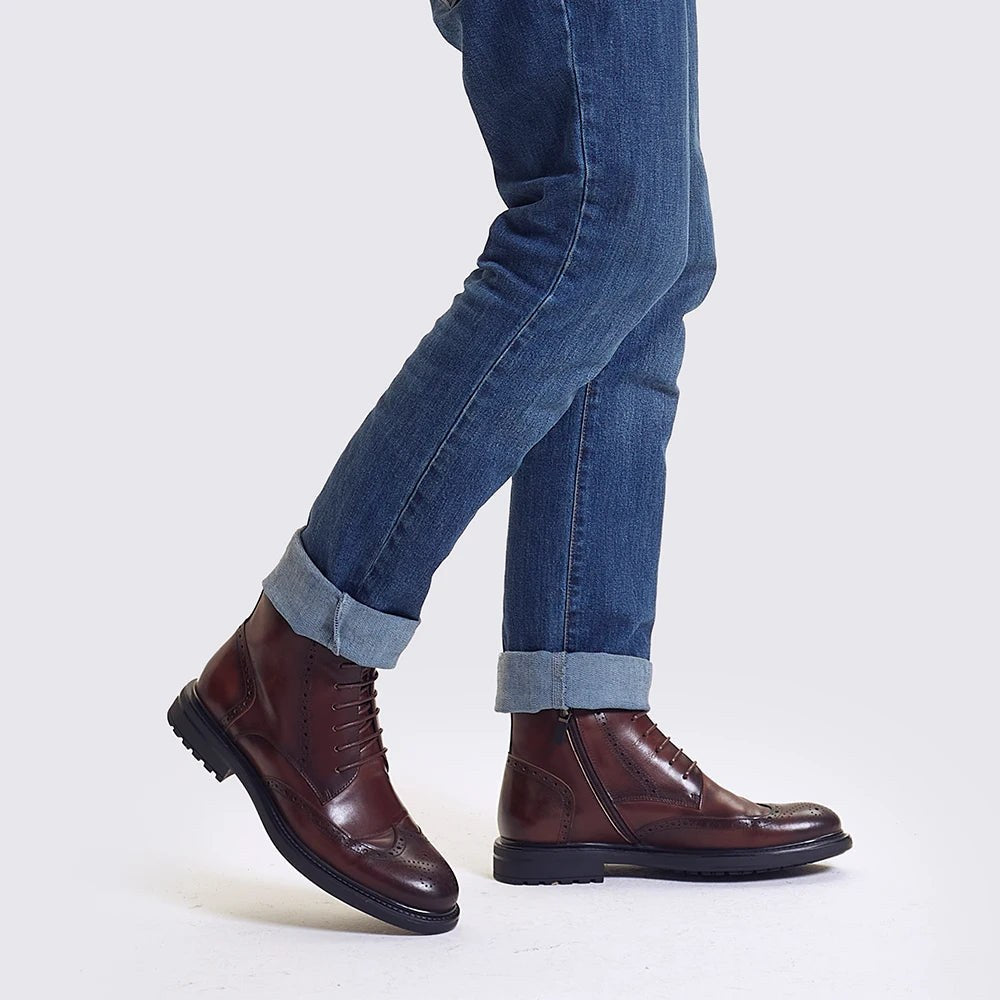 Leather wingtip boots with side zips
