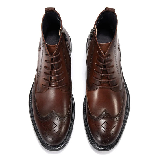 Leather wingtip boots with side zips