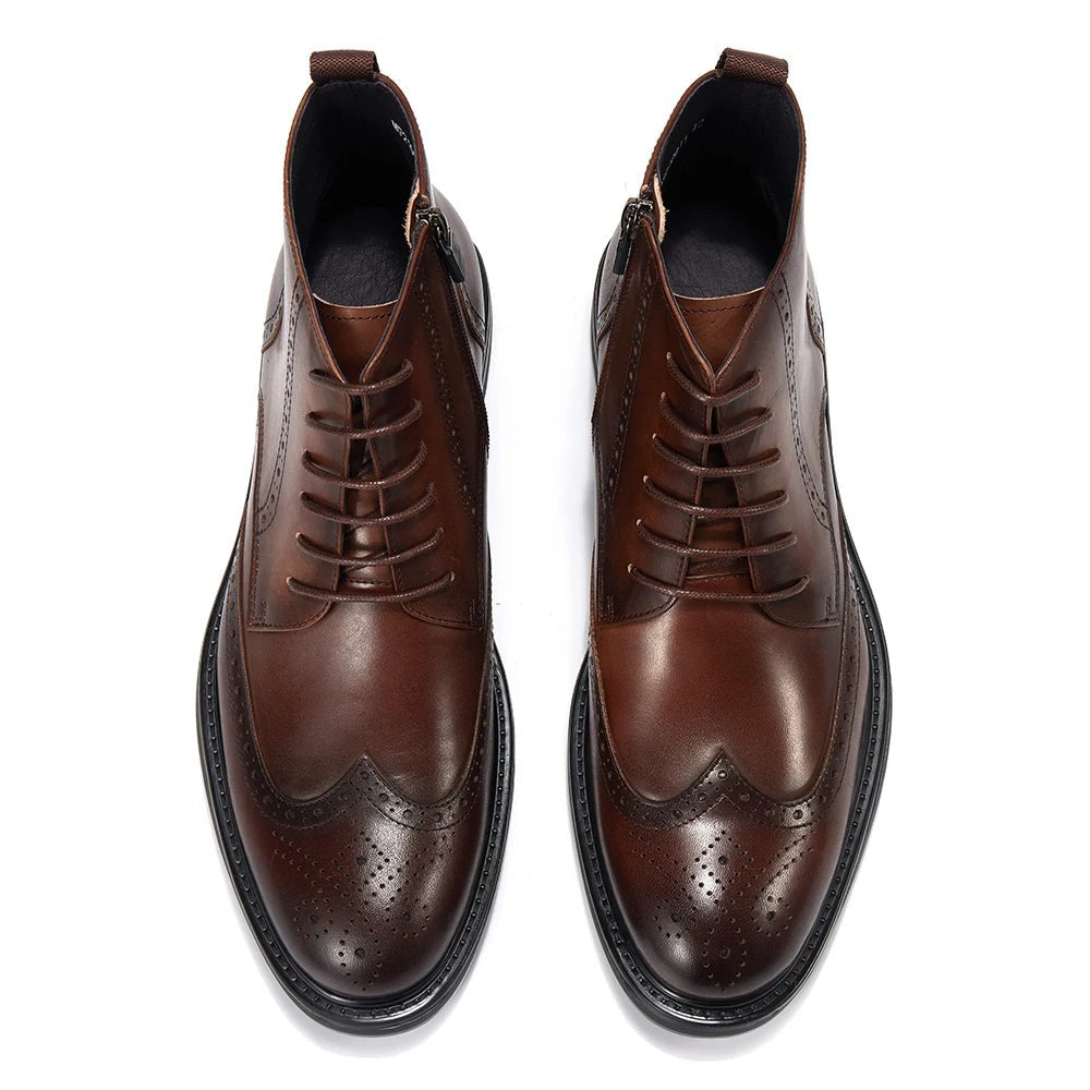 Leather wingtip boots with side zips