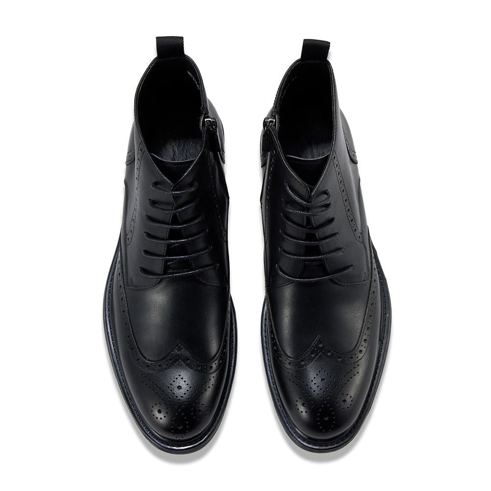 Leather wingtip boots with side zips