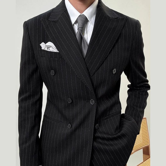 Leo grooms elegant suit