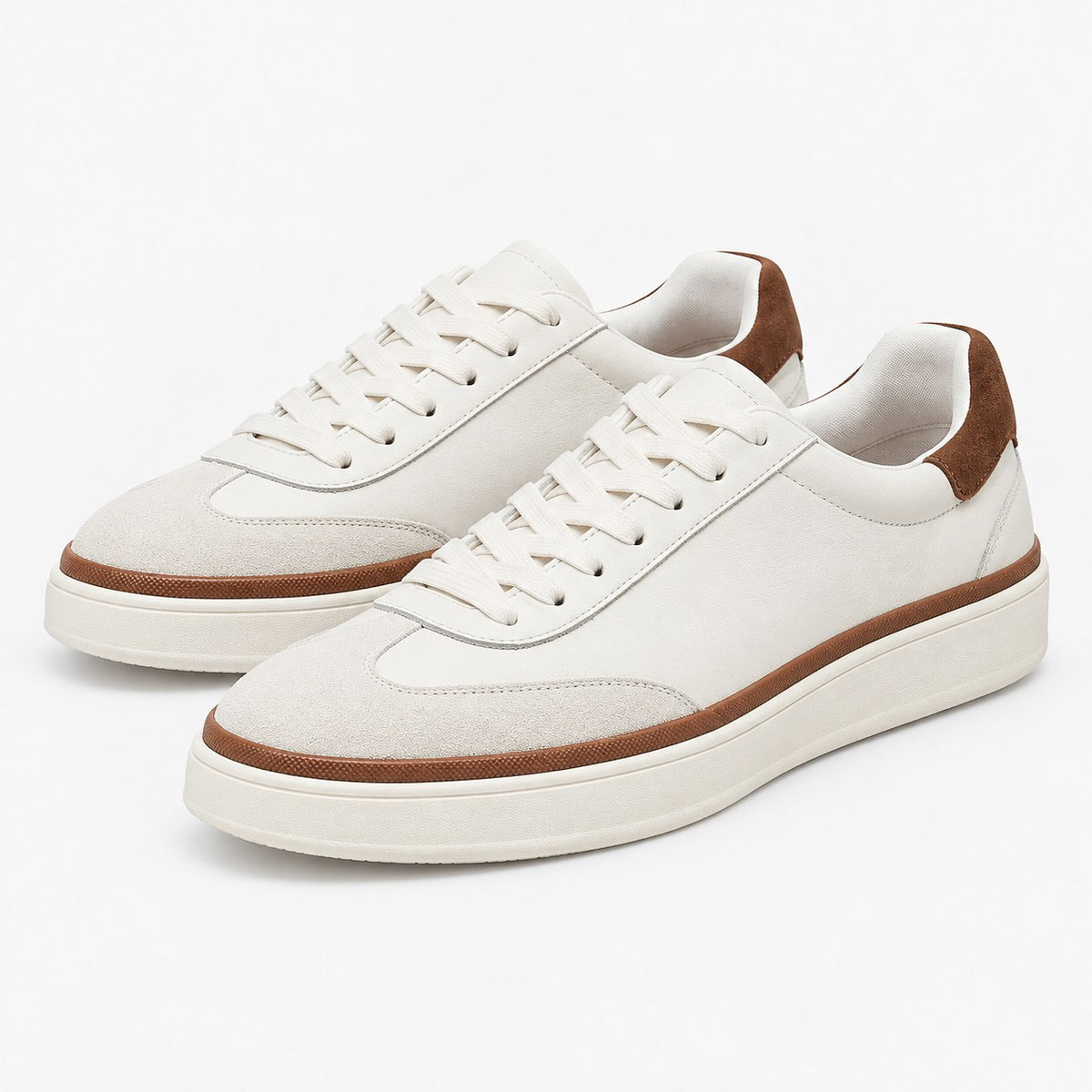 White leather sneakers with brown trim